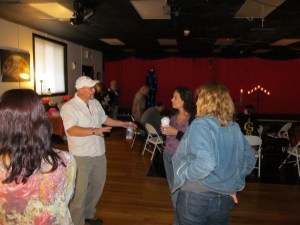 Robert T. Smales talking with Tracy Carbone and Stacey Longo. Photo by Jason Harris.