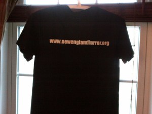 The back of the t-shirt.