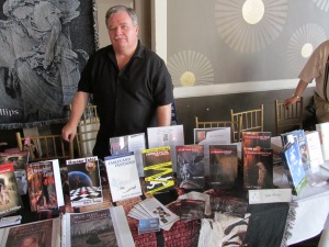 Author Dale T. Phillips behind his table.