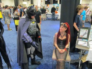 Batman talking with a mermaid.