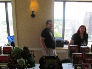 Authors David Cassenti and Laura Hickman behind the NEHW table.