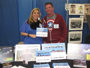  Susan Saunders and Rob Watts holding their book,  Snowpocalypse.