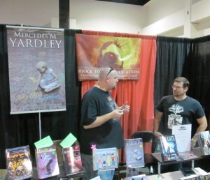 Author K. Allen Wood and artist Jessie Young behind the Shock Totem table.