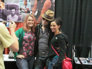 Actor Michael Rooker (The Walking Dead) with two fans.
