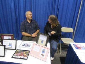 Survivor's Richard Hatch talking with author Stacey Longo.