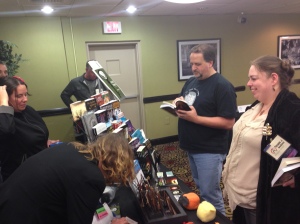 A lot of activity at the Books and Boos table.