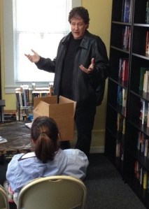 Author Mark Allen Baker talks about his book during his visit to the Colchester bookstore, Books & Boos.