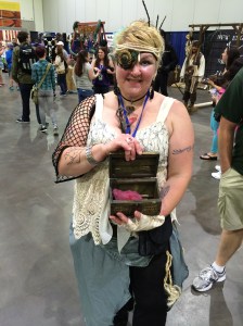 Calypso holding Davey Jones' heart.