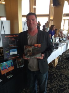 Author Rob Watts with his newest book, Left-Hand Path.