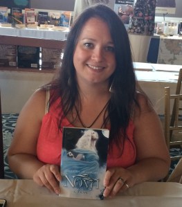Author A.J. Kane with her first novel, Nova.