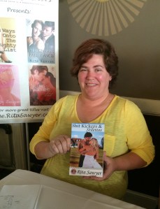 Author Rita Sawyer with her book, Shit Kickers & Stilettos.