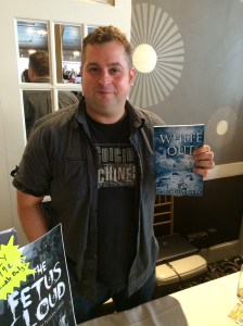 Author Eric Dimbleby with his newest book, White Out. 