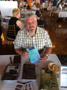 Author L.E. Hastings with his book, You, Me and Everything In Between.