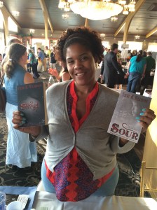 Author Uzuri M. Wilkerson with her two books, Sweet and Sour.