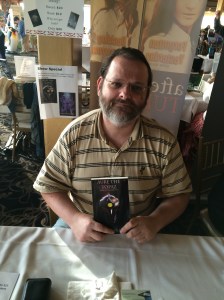 Author Rich Feitelberg with his book, Aure the Topaz.
