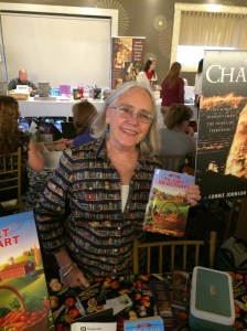 Author Edith Maxwell with her book, 'Til Dirt Do Us Part.