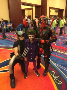 Wolverine, Joker, and Deadpool with Spiderman photo-bombing in the background.  