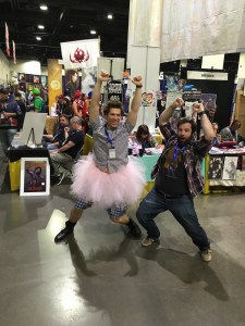 Ace Ventura dancing with a fan.